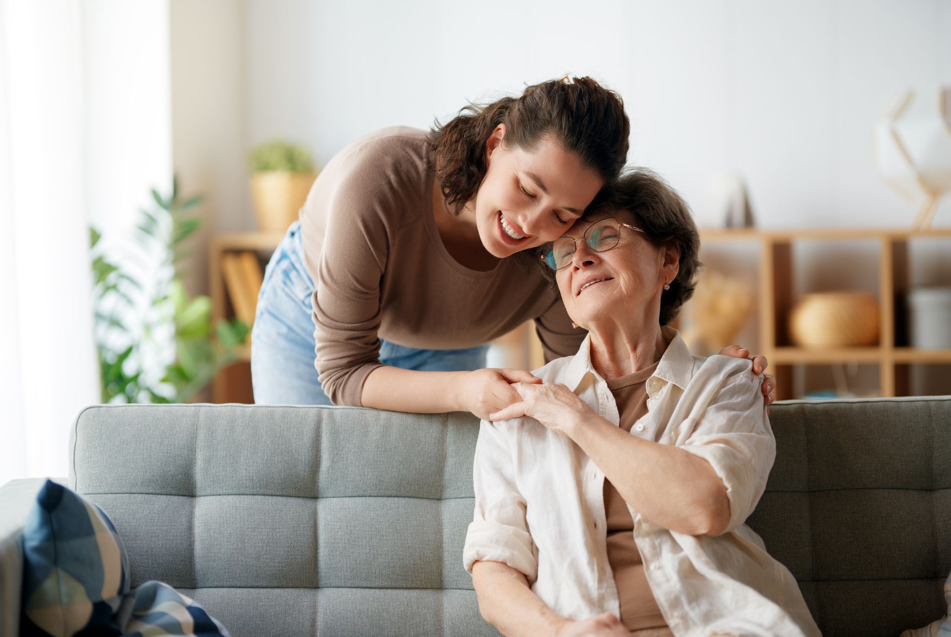 An older woman enjoying quality time with her daughter after a successful SI fusion.