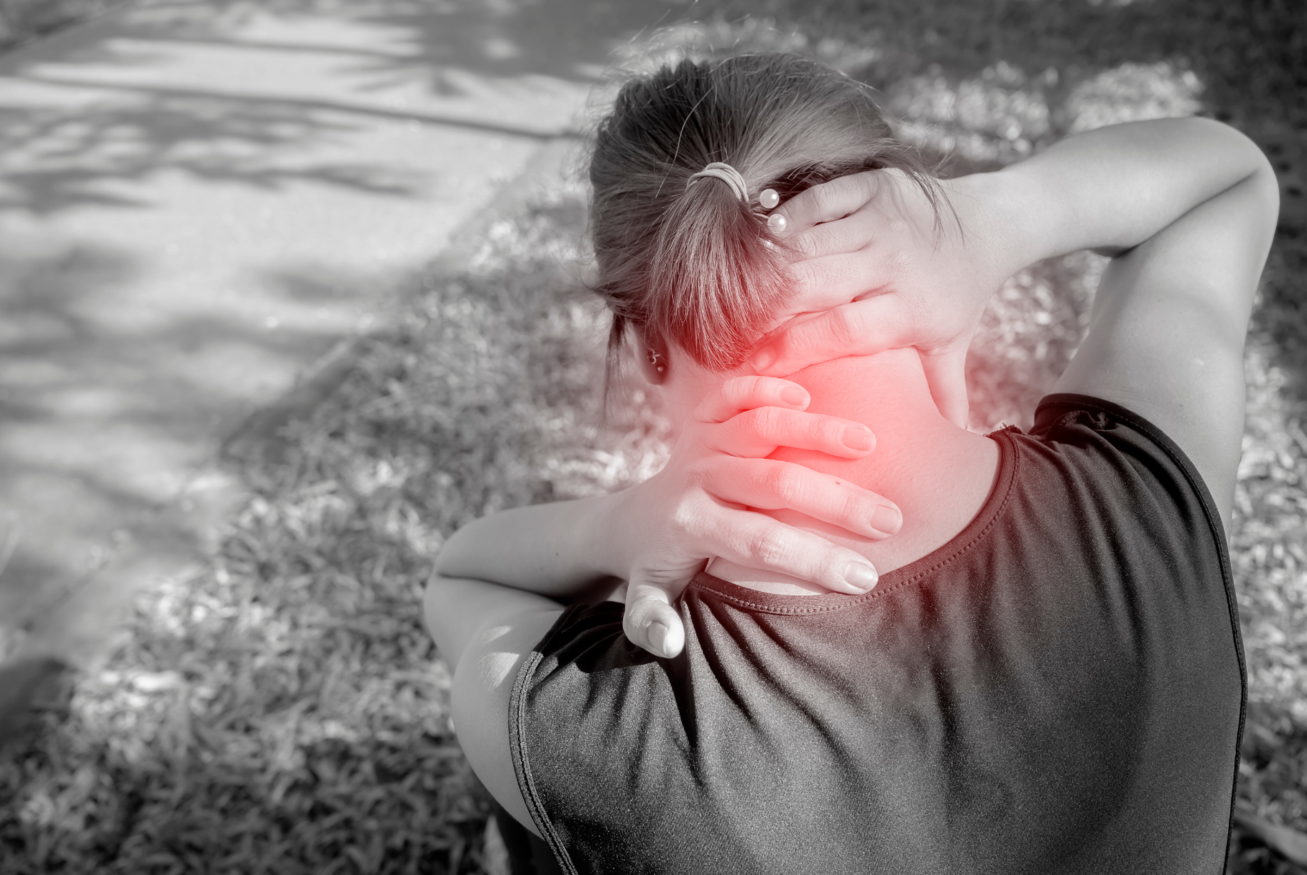 Woman suffering from chronic neck pain even after conservative treatment. A cervical disc replacement would be a good option for her.